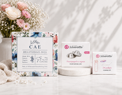 Silverette Nurturing Essentials Bundle featuring silver nursing cups, cream, and accessories for breastfeeding comfort and support.